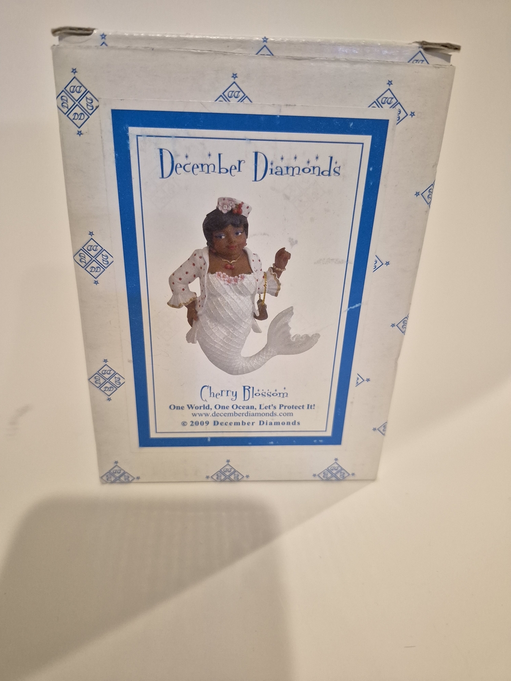 December Diamonds-Cherry Blossom White Mermaid Figurine